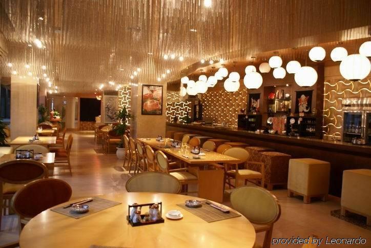 New Century Grand Hotel Кайфен Ресторан фото